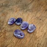 Amethyst oval crystal pendant from GemstoneGO, showcasing a polished natural stone bead for jewelry making.