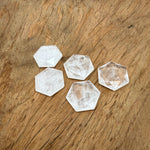 Faceted clear quartz hexagon crystal pendant on a necklace, showcasing a polished gemstone bead from GemstoneGO.