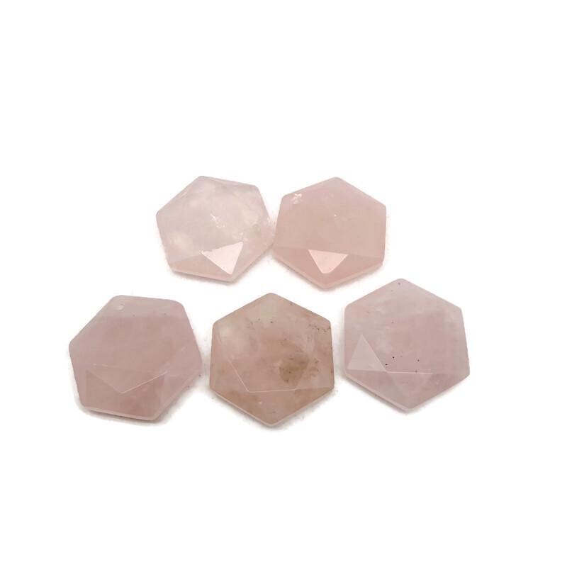 Faceted rose quartz hexagon crystal pendant necklace with a smooth gemstone bead, showcasing a natural pink hue and elegant design.