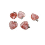 Faceted cherry quartz heart crystal pendant from GemstoneGO, showcasing a natural pink gemstone with a smooth, polished heart shape.