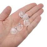 Faceted clear quartz heart crystal pendant from GemstoneGO showcasing a natural gemstone charm with intricate faceting.