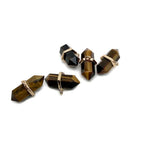 Tiger Eye double terminated crystal pendant featuring a natural gemstone point with rich golden-brown tones and smooth polished surface.