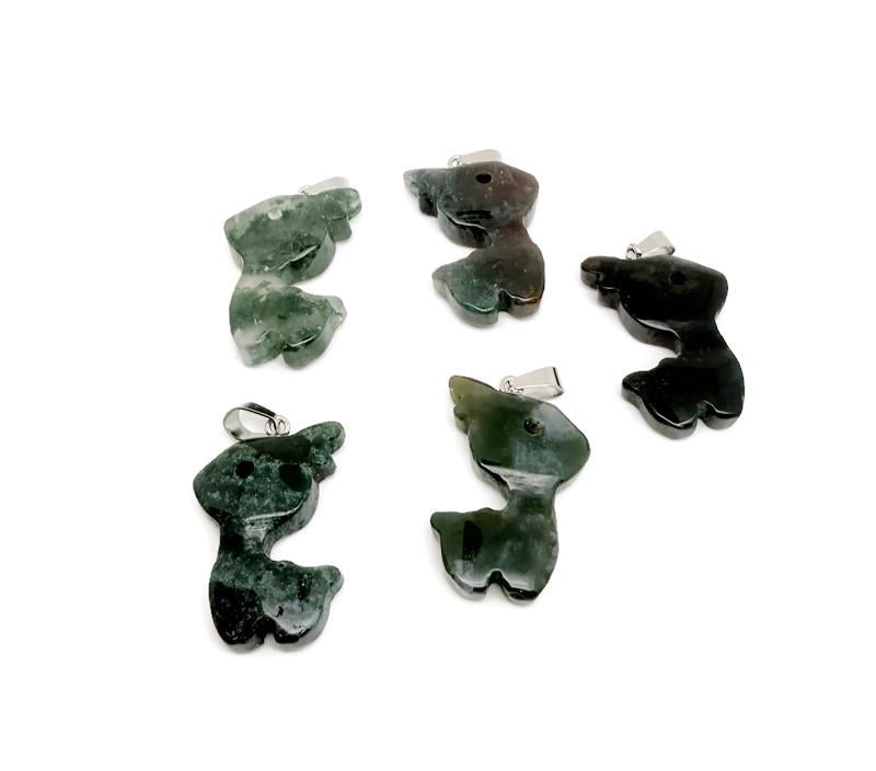 Moss agate deer crystal pendant necklace featuring a gemstone deer charm on a silver chain, displayed against a neutral background.